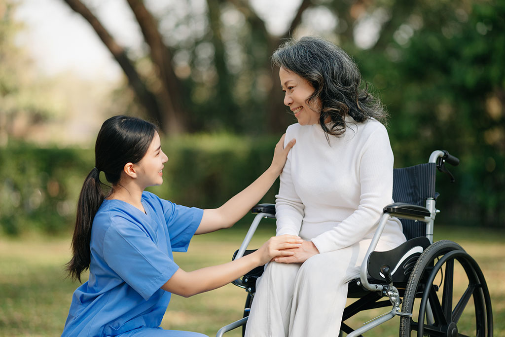elderly-asian-senior-woman-wheelchair-asian-careful-caregiver-nursing-home